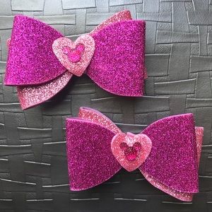 Pink Minnie mouse bows.